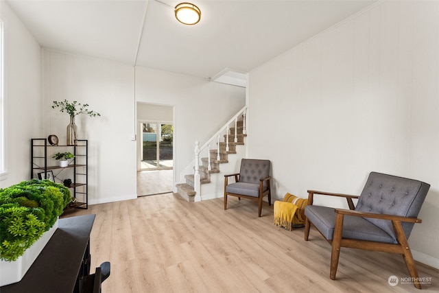 sitting room with light hardwood / wood-style floors