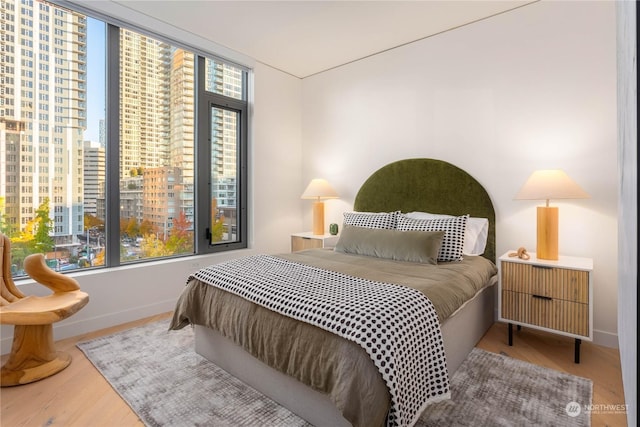 bedroom featuring hardwood / wood-style flooring