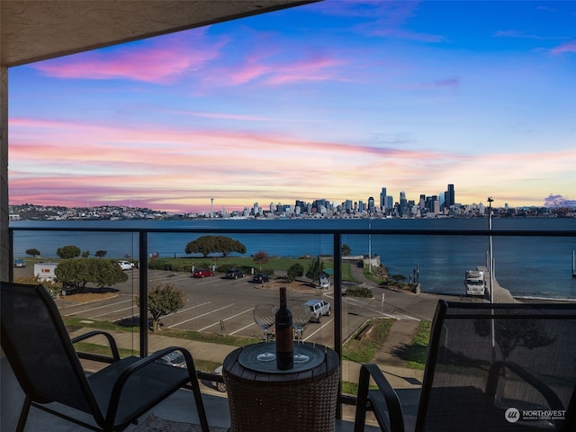 balcony at dusk with a water view