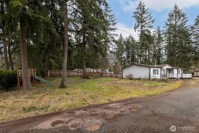 view of yard with fence