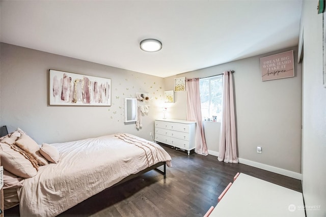 bedroom featuring dark hardwood / wood-style floors