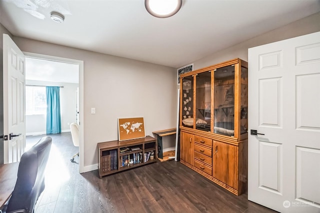 home office featuring dark hardwood / wood-style floors