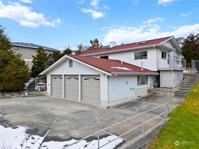 view of home's exterior with a garage