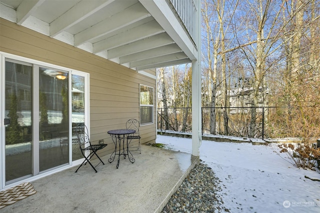 view of snow covered patio