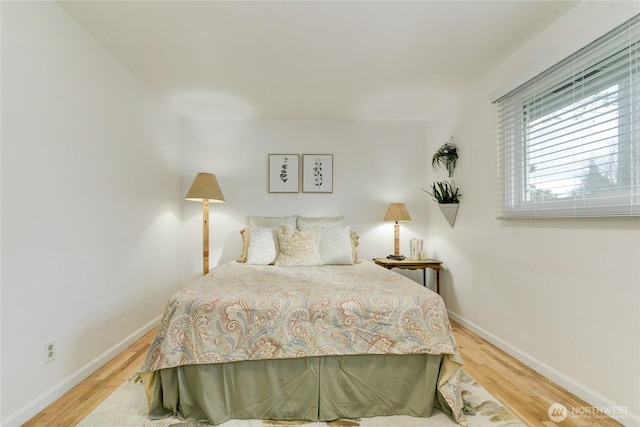 bedroom featuring hardwood / wood-style floors