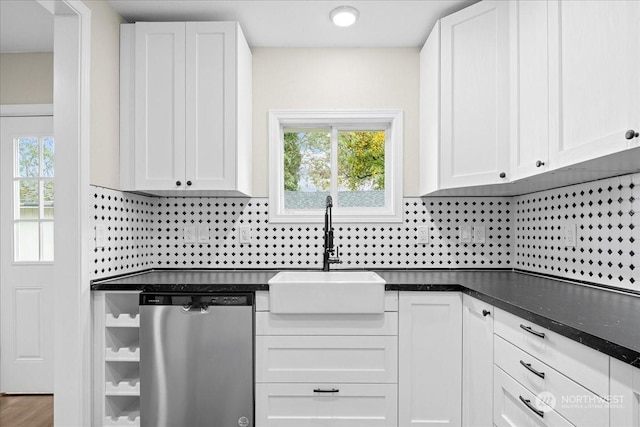 kitchen with sink, stainless steel dishwasher, and white cabinets