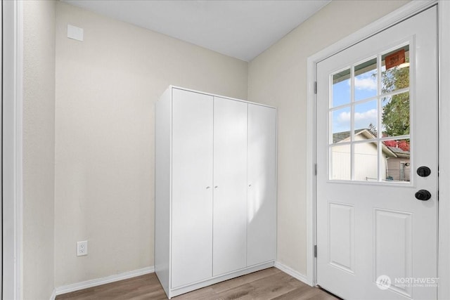 doorway featuring light hardwood / wood-style floors