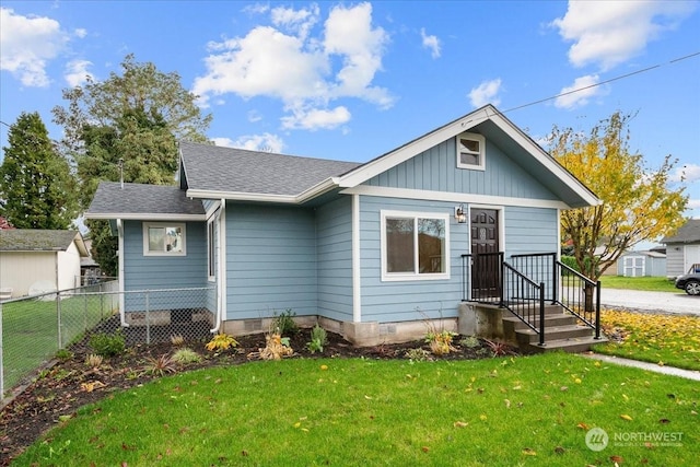 view of front of home featuring a front lawn