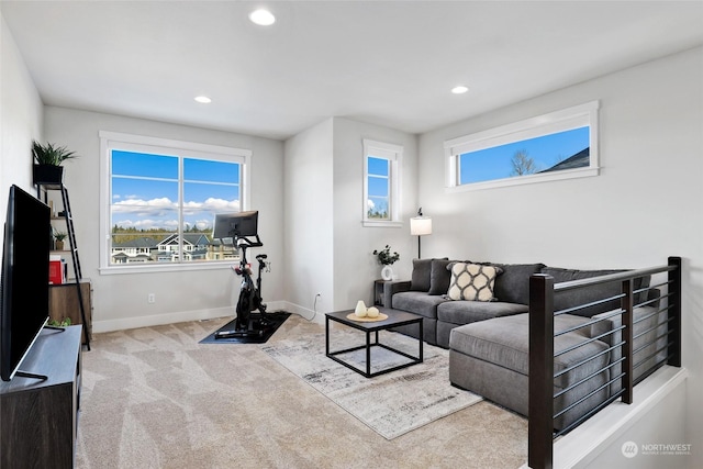 living room featuring light colored carpet