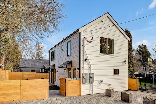 rear view of house featuring a patio area