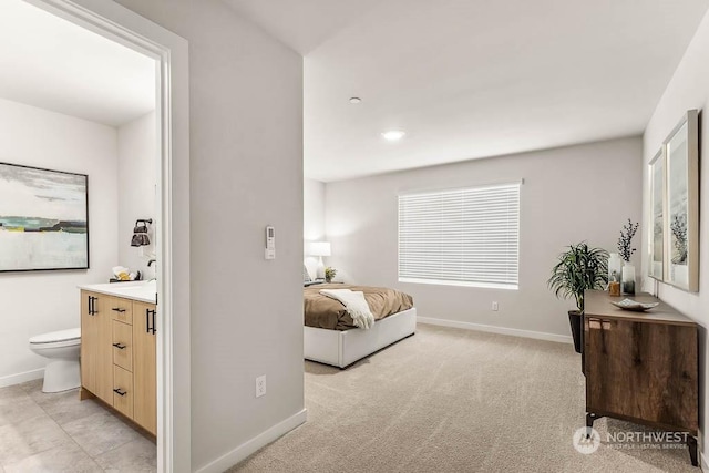 bedroom with light colored carpet