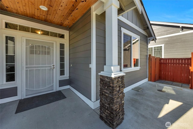 property entrance with covered porch