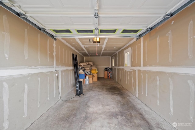 garage featuring a garage door opener