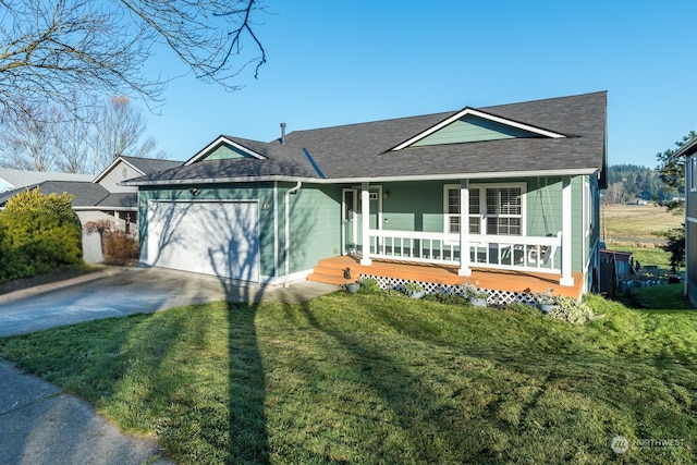 ranch-style house featuring a garage, covered porch, and a front yard