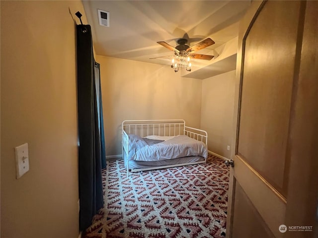 bedroom with ceiling fan and carpet