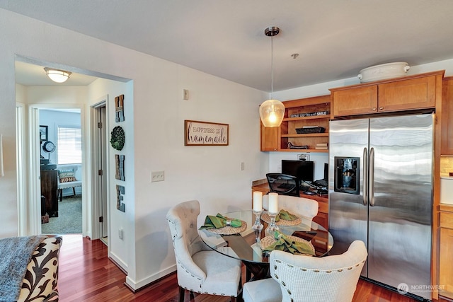 dining room with dark hardwood / wood-style floors