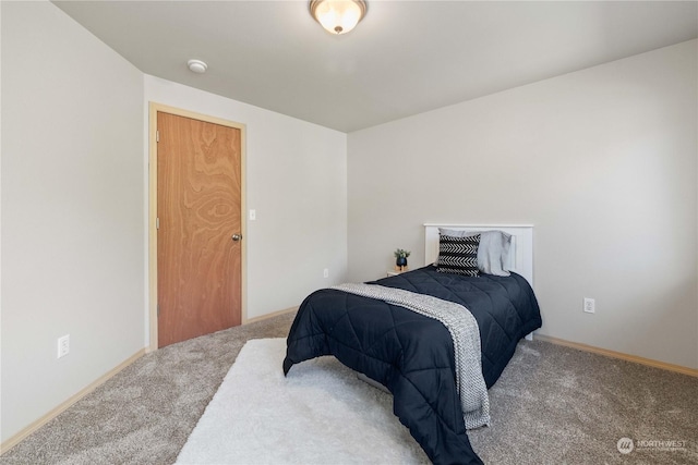 bedroom featuring carpet