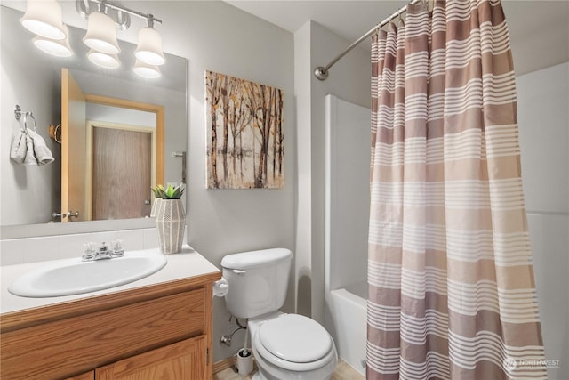 full bathroom with vanity, toilet, and shower / bath combo with shower curtain