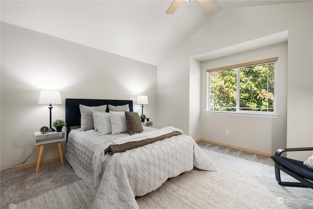 bedroom with ceiling fan, lofted ceiling, and carpet floors