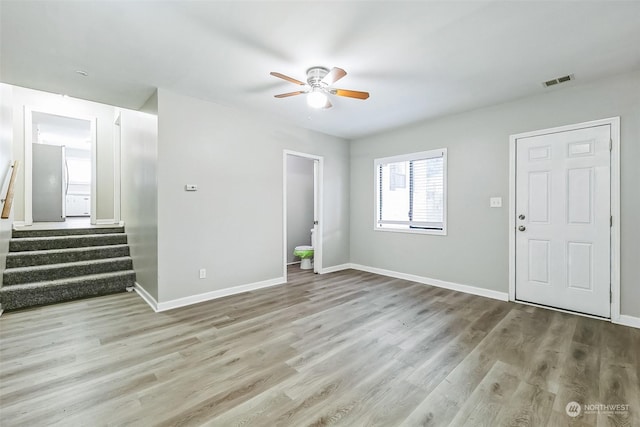 interior space featuring light hardwood / wood-style flooring and ceiling fan