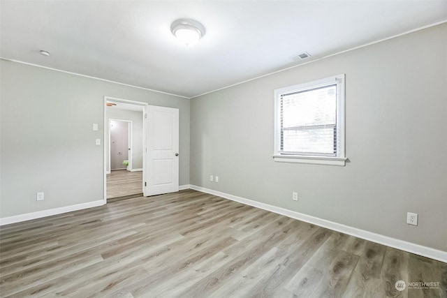 unfurnished bedroom with light hardwood / wood-style floors