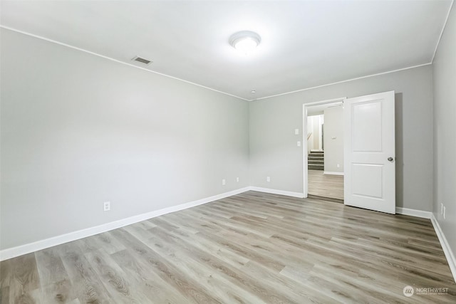 unfurnished bedroom featuring light hardwood / wood-style floors