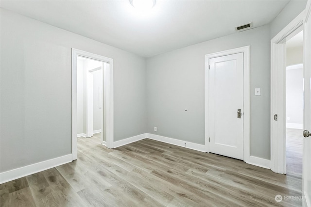 empty room featuring light hardwood / wood-style flooring