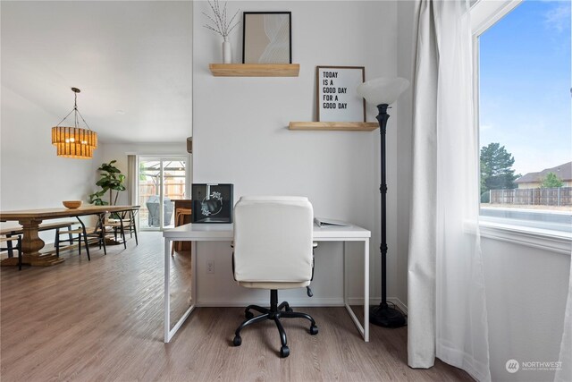 home office with light wood-type flooring