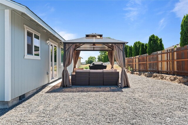 view of yard featuring an outdoor living space and a gazebo