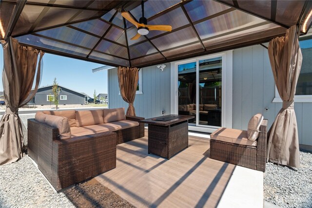 view of patio featuring a gazebo and an outdoor hangout area