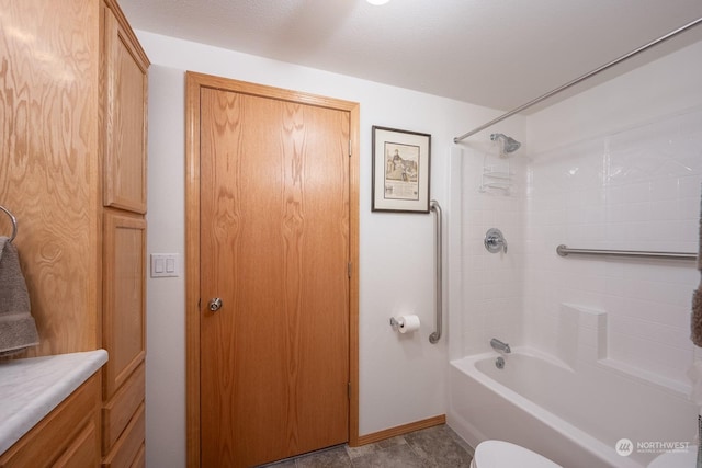 full bathroom featuring shower / bathtub combination, vanity, and toilet