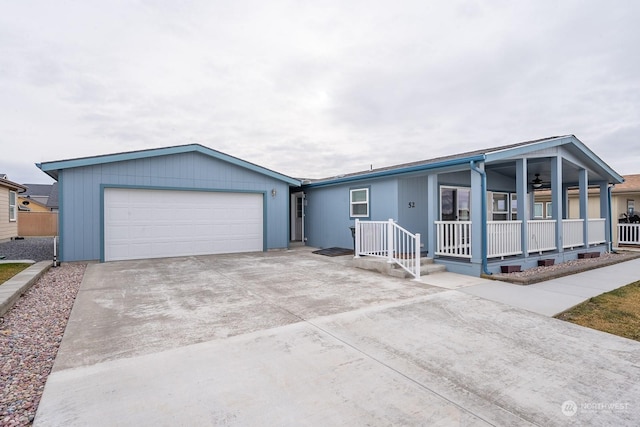 view of front of house featuring a garage and covered porch