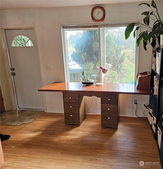 office area with wood-type flooring