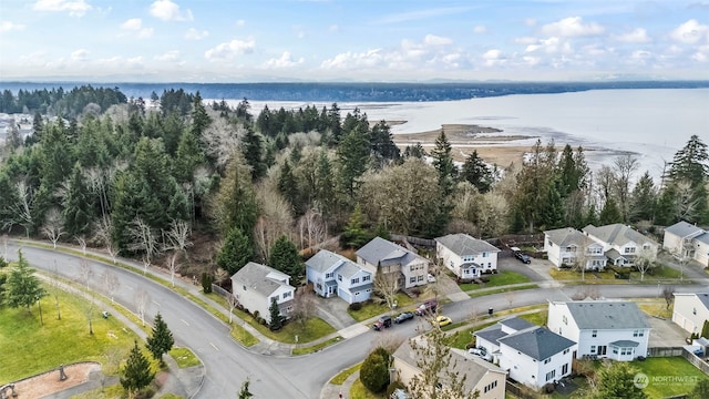 drone / aerial view featuring a water view