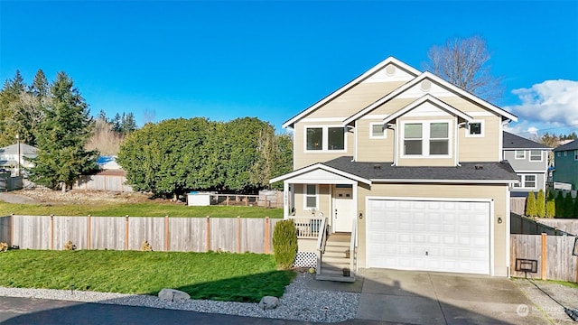 view of front of house with a garage and a front lawn