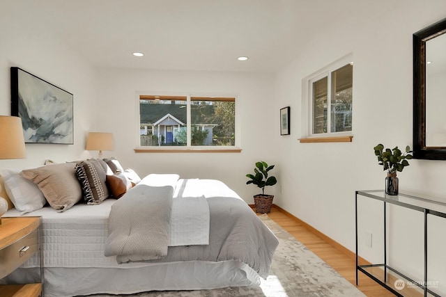 bedroom featuring light wood-style floors and recessed lighting