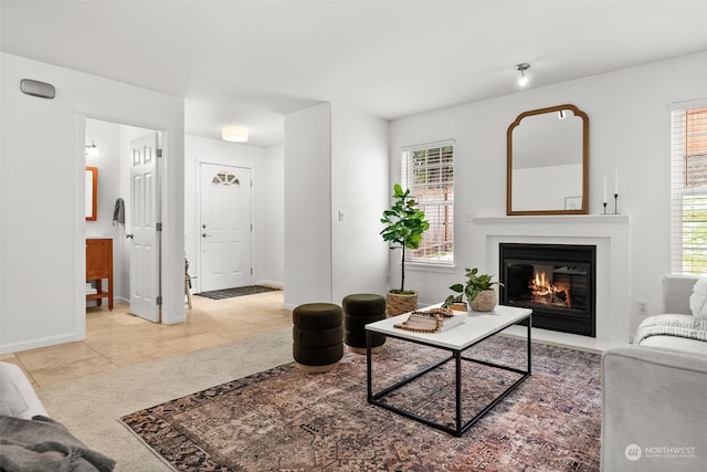 living room featuring light tile patterned flooring