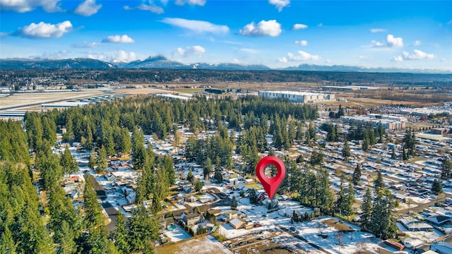 drone / aerial view featuring a mountain view