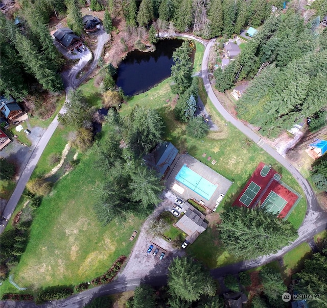 birds eye view of property featuring a water view