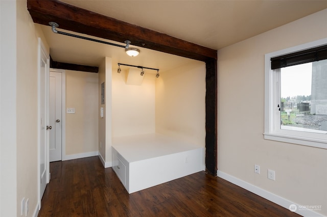 mudroom with dark hardwood / wood-style floors and beamed ceiling