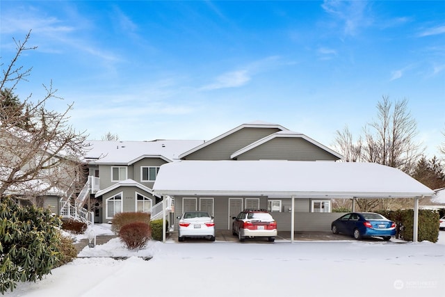 view of front of home featuring a carport