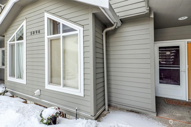 view of snow covered property