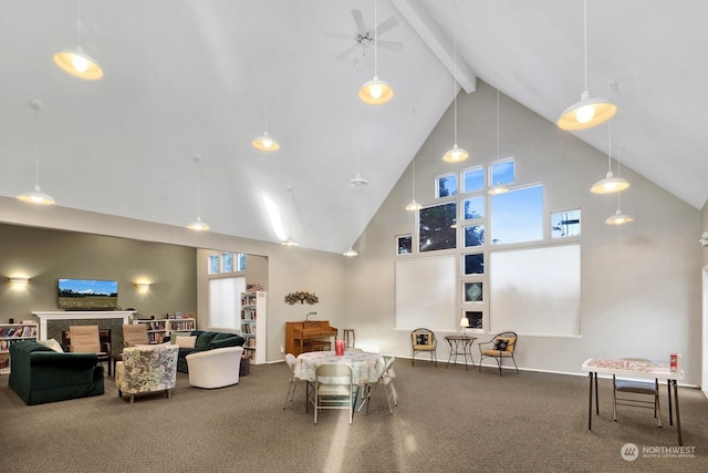 living room featuring beamed ceiling, carpet flooring, and high vaulted ceiling