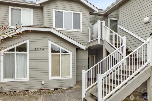 view of property exterior with stairway