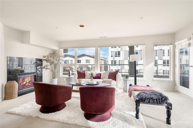 living room featuring light colored carpet