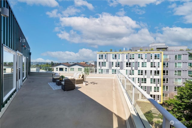 exterior space with a balcony and an outdoor hangout area