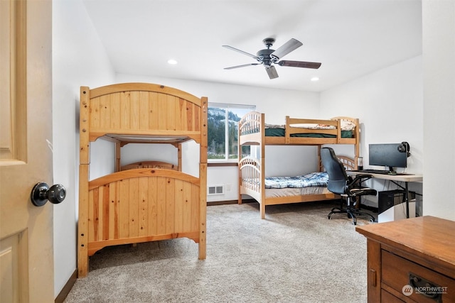 carpeted bedroom with ceiling fan