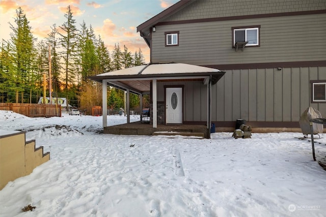 view of snow covered house