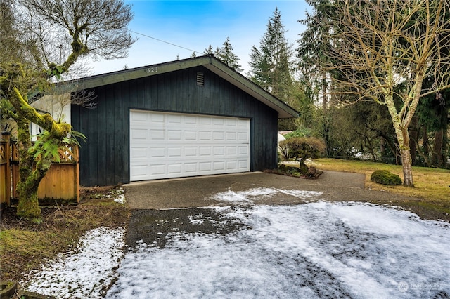 view of snow covered garage