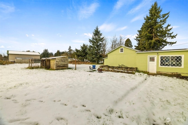 view of yard covered in snow